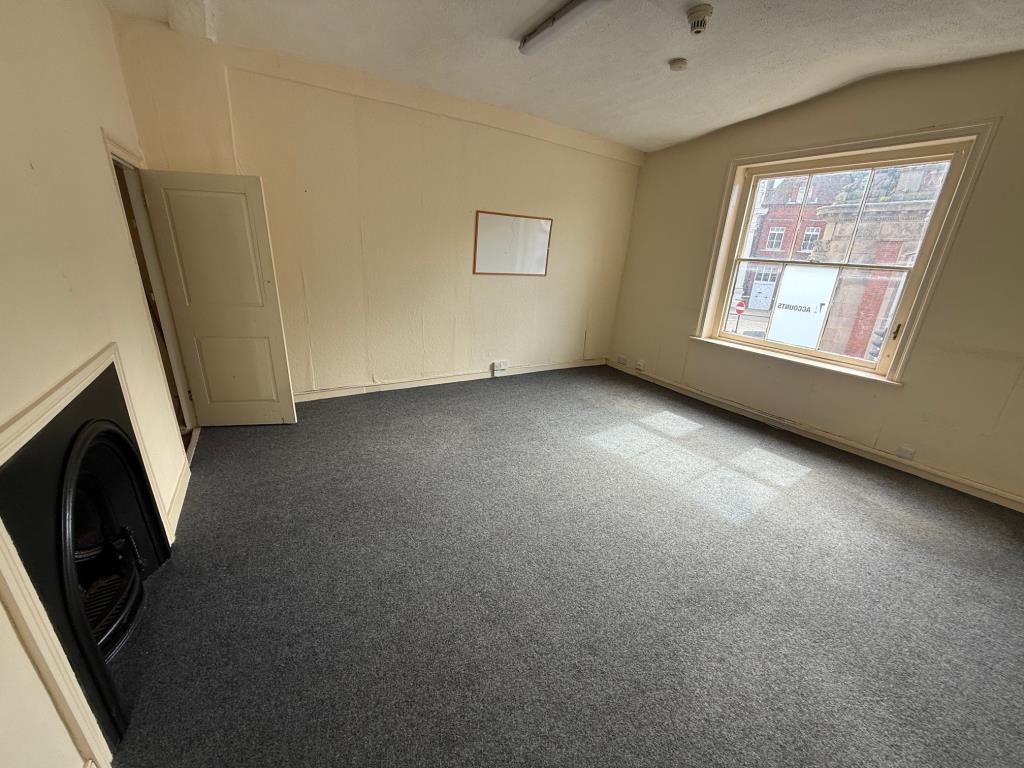 Lot: 61 - TENANTED GROUND FLOOR SHOP WITH VACANT OFFICE ABOVE - 40 Burkitts Lane - First Floot office at front of the building